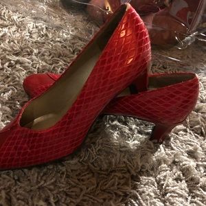 Red reptile print pumps